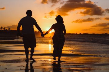 Couple at sunset beach